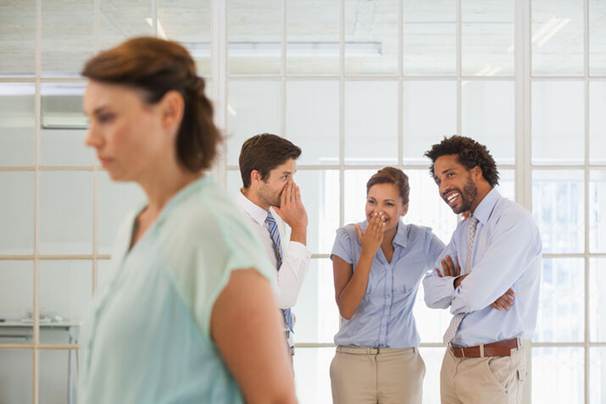 Coworkers talking about woman behind her back - Hostile Work Environment